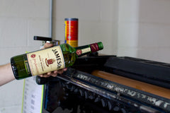 A wee bit of whiskey is added to the ink used to print each edition