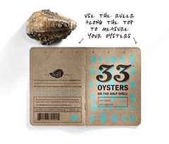 Use the ruler along the top of the book to measure the length of your oyster